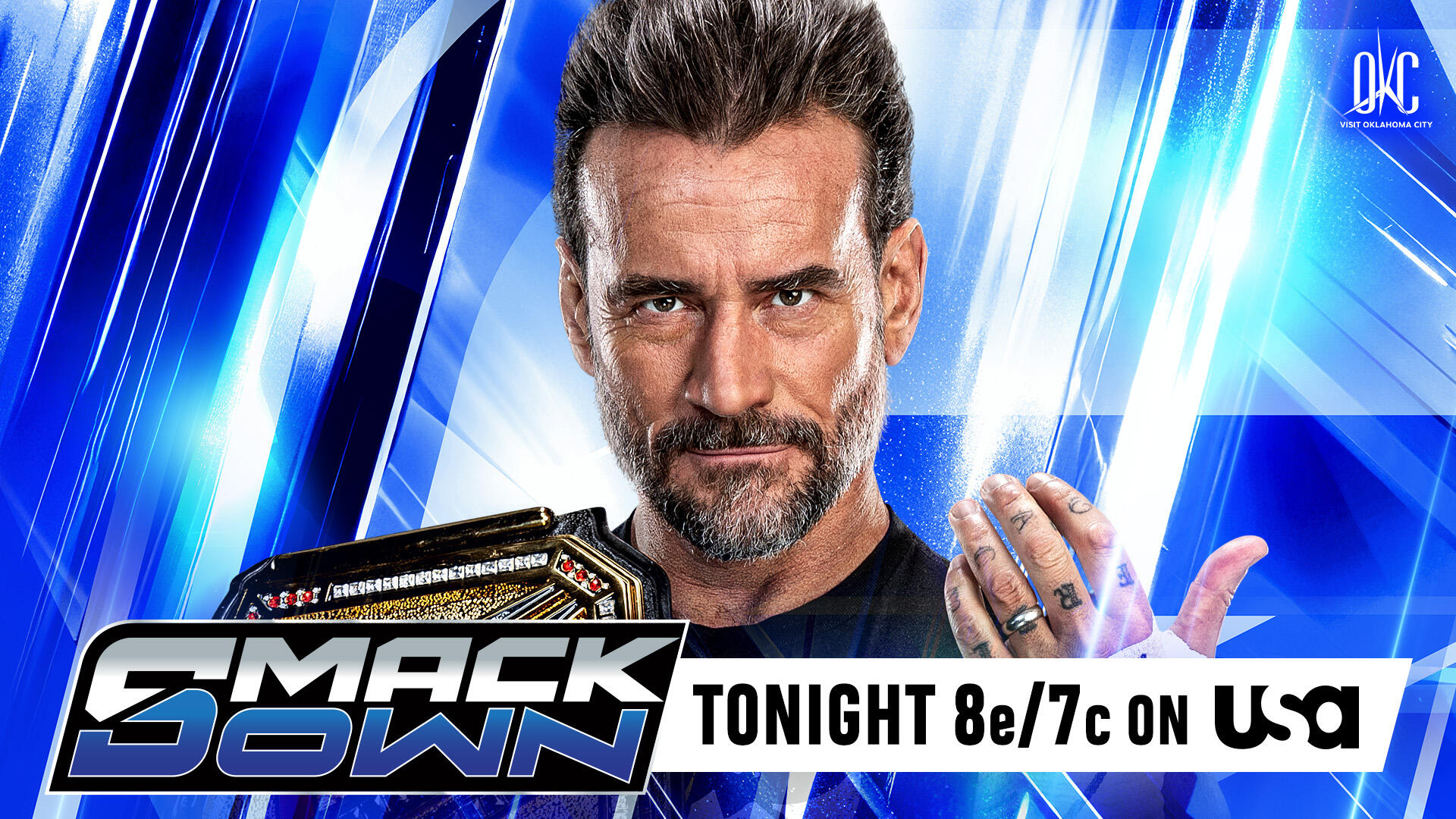 CM Punk aparece con el Campeonato Indiscutible de WWE en un gráfico promocional de SmackDown para el episodio en Oklahoma City.